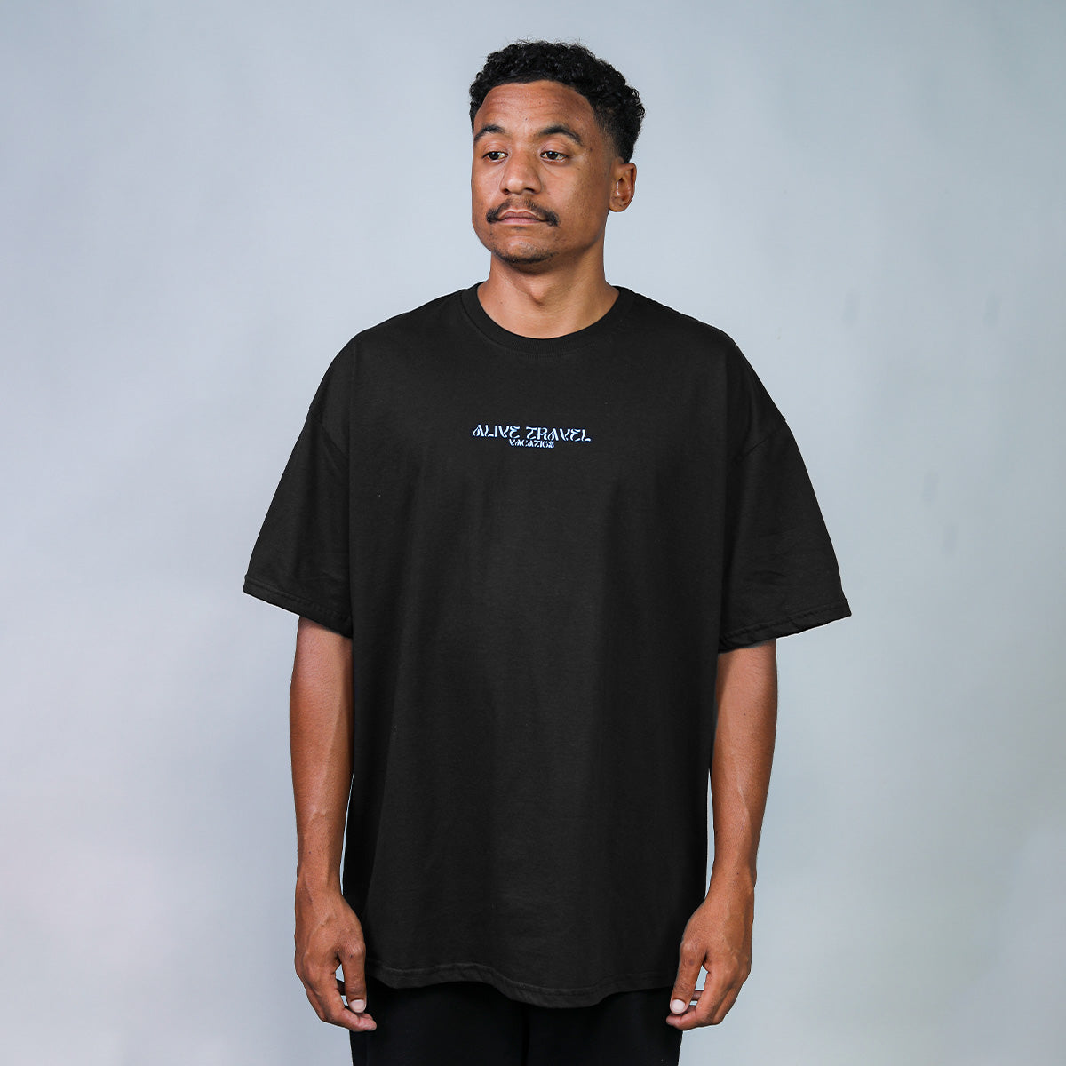 Camiseta Alive Oversized Essencial Vacation Preto