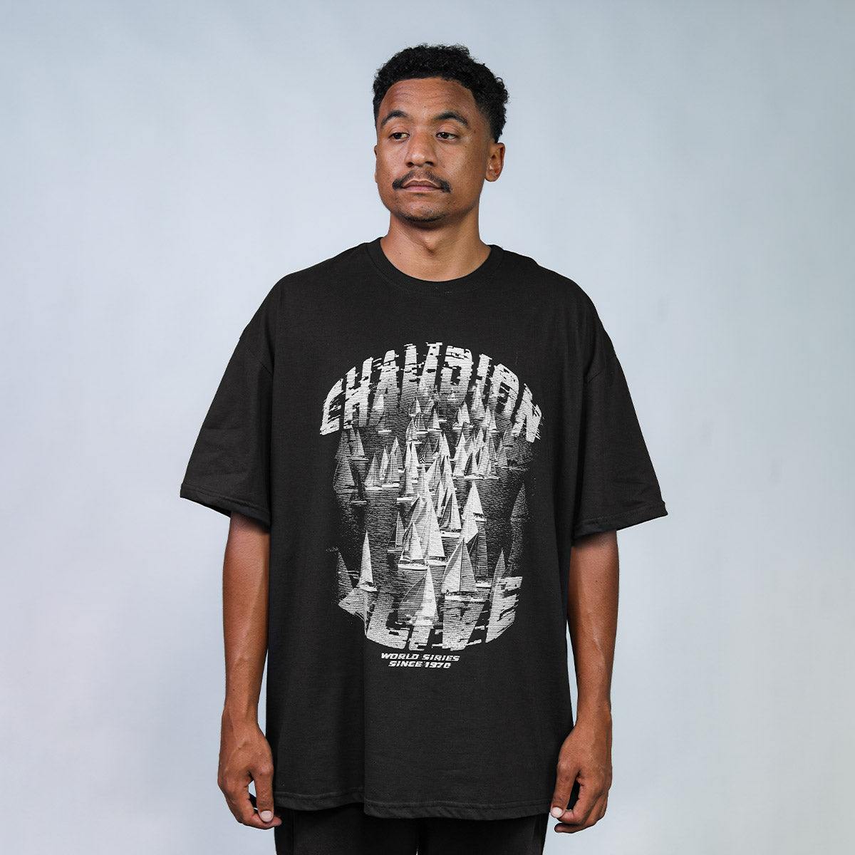 Camiseta Alive Oversized Essencial Champion Preto