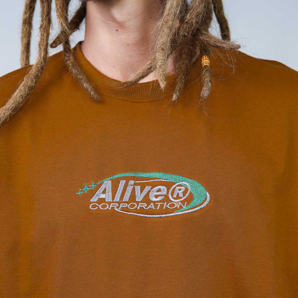 Camiseta Alive Oversized New Corporation Marrom