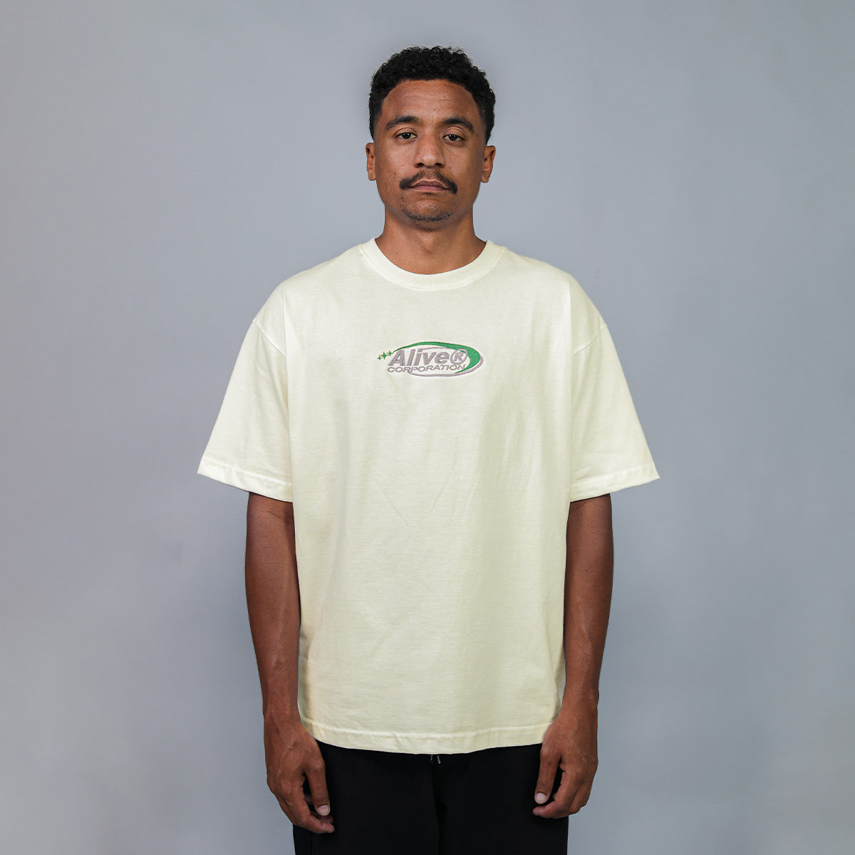 Camiseta Alive Oversized New Corporation Off White